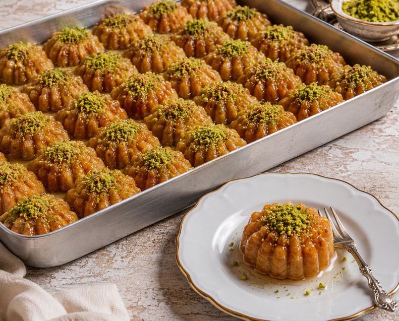 Şerbetli Sümbül Tatlısı Tarifi Şerbetli Sümbül Tatlısı Tarifi Malzemeler Hamuru İçin 125 g tereyağı